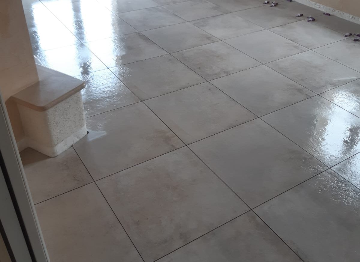 Pose carrelage grands carreaux